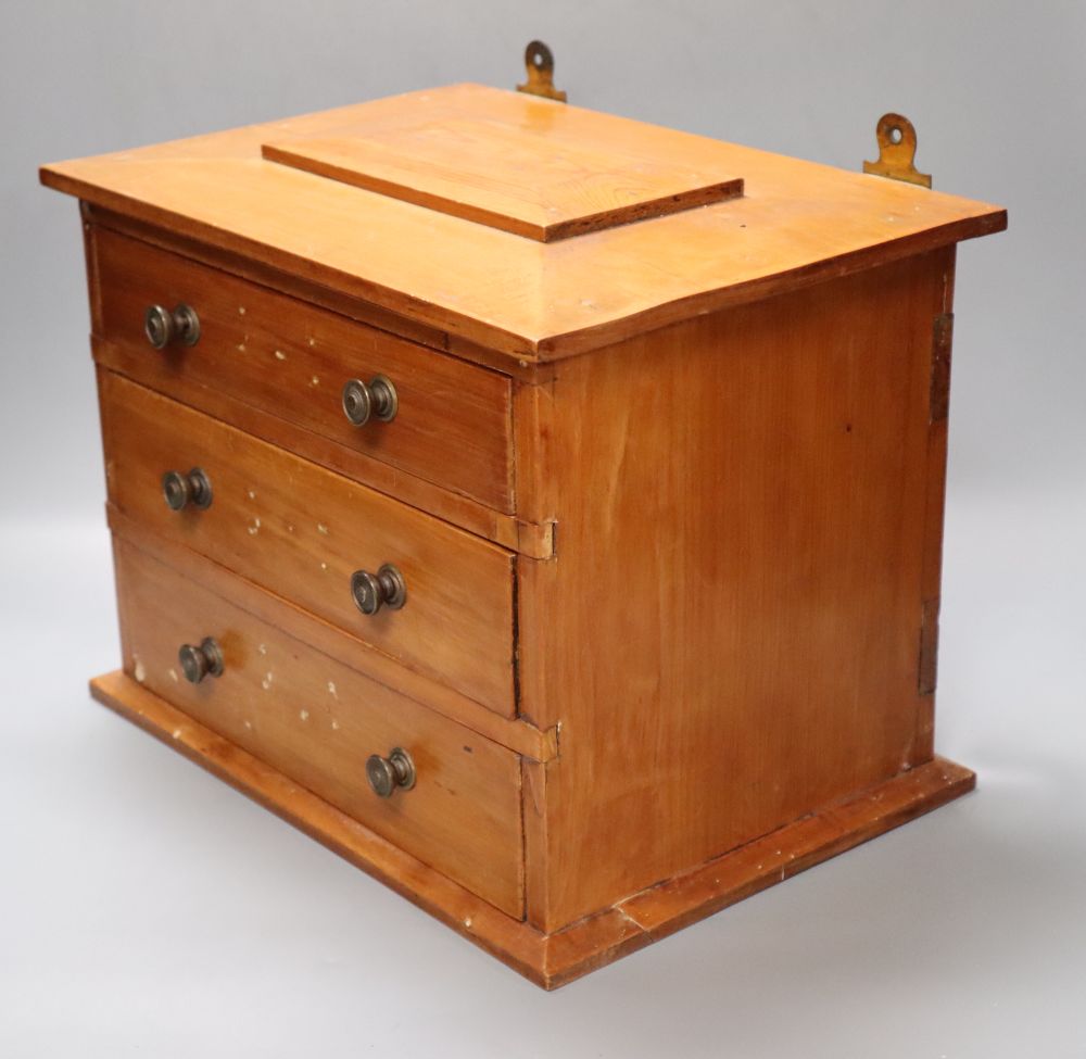 A Community silver plated canteen in three drawer pine chest, 36cm